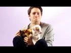 Dylan O'Brien From The Maze Runner Plays With Puppies