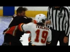 Ryan Kesler sends Matthew Tkachuk's mouthguard flying with right fist