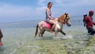 Riding horses in Ombak Sunset-Gili Trawangan